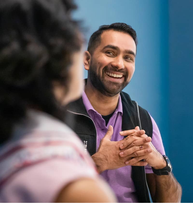 Two people in conversation.